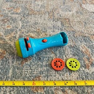 B. toys "Light Me to the Moon" Kids Projector Flashlight Toy